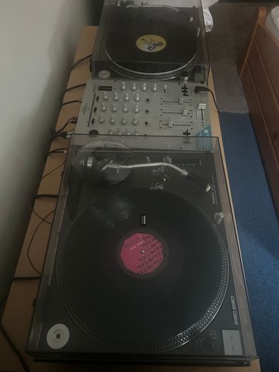 Technics 12/10s and mixer and 150 vinyl records