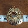 Vintage gold tone brooch. Image 5