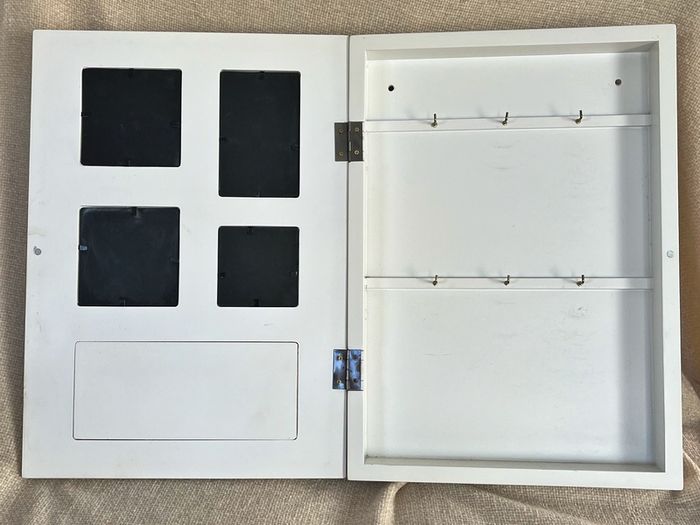 Small press/cupboard for holding keys, chains, rings etc..