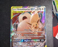 pokemon eevee and snorlax gx tag team