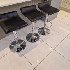 Black faux leather bar kitchen stools with chrome base