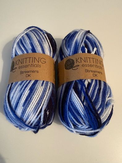 6 balls of blue yarn wool