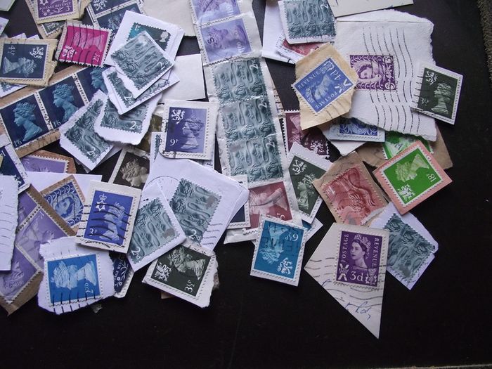 A box with collection of stamps from Great Britain