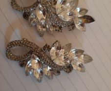 2 x matching brooches