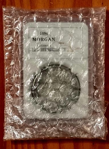 2PC  1894 Silvery + 1895 Golden 1 Dollar. New, unopened.