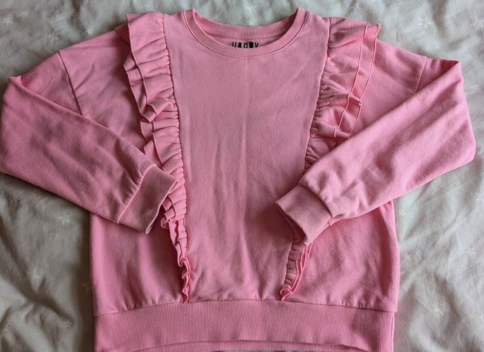 Pink jumper age 10-11