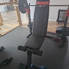 gym equipment. Weight Bench adjustable  bar and weights