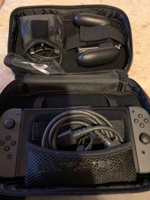 Nintendo Switch Console with accessories and carry case