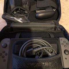Nintendo Switch Console with accessories and carry case