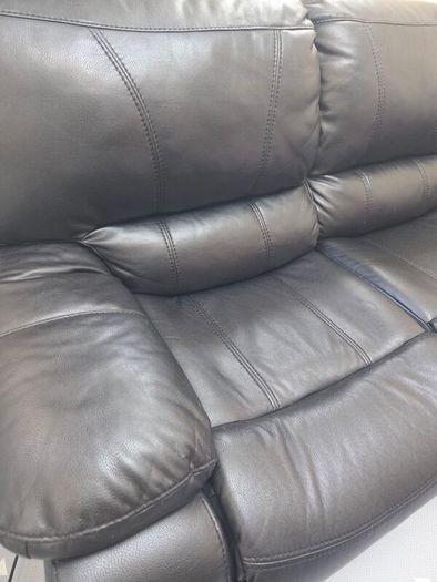 Black leather recliner sofa