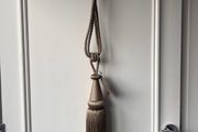 Pair of NEW taupe curtain tiebacks