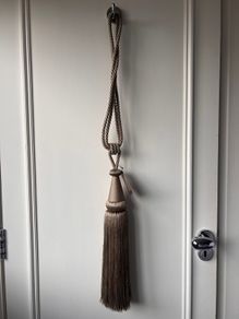Pair of NEW taupe curtain tiebacks