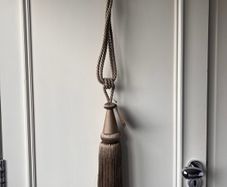 Pair of NEW taupe curtain tiebacks