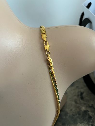 Gold tone JJ necklace