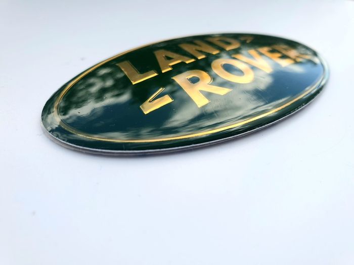 LAND ROVER Defender SVX Green and Yellow (gold) letters GRILL OVAL BADGE 105mm - 53mm 105  53