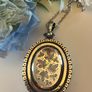 Victorian Sterling Silver Locket with beautiful engraved Ivy Leaves on both sides and & raised detailing around the edge. The locket is late 1800s It hold a bouquet of dried flowers inside. Choice of 18" or 30" Chain. Please PM for details. Katie P. Image 6