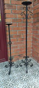2 x long black candlesticks, slight damage from use at top as shown