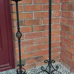 2 x long black candlesticks, slight damage from use at top as shown
