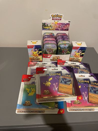 Pokemon 30th anniversary tin collection booster bundle blister packs
