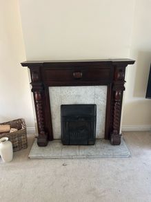Wooden mantelpiece and marble