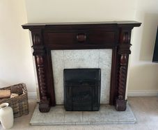 Wooden mantelpiece and marble