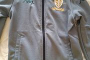 leeds United centenary top age 8/9
