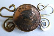Vintage Twisted brass and Copper Foreign Coin Pin
