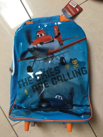 Two NEW school bags. Disney Planes pull along. Pink Flamingo back pack.