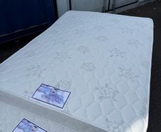 double mattress needs a bit of a wipe after being in storage.