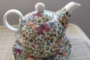 Tea pot cup and saucer