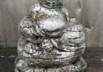 Reconstituted Silver stone Buddha garden statue.
