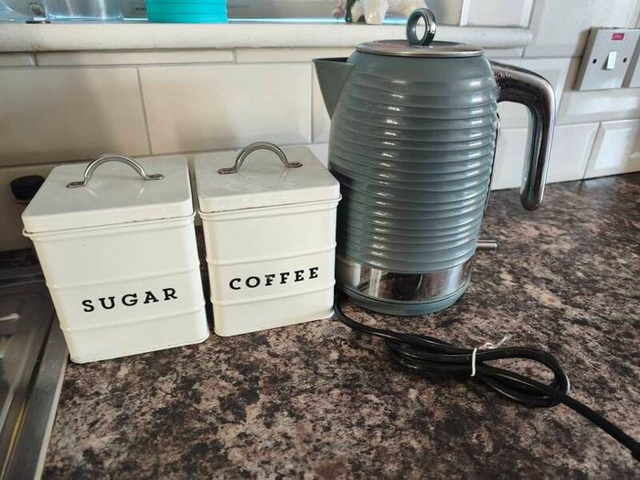 coffe and suger tines and kettle.