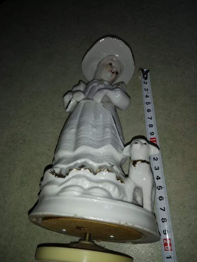 Lovely musical lady figurine with baby lamb.