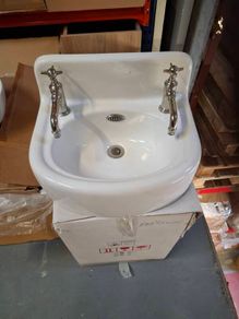 Arcade cloakroom basin with tap