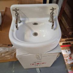 Arcade cloakroom basin with tap