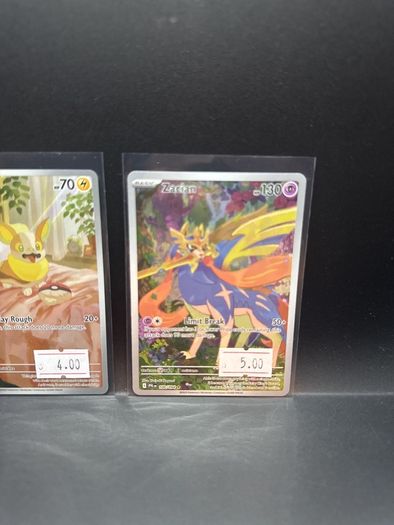 Yamper 099/094 | Zacian 100/094 Pokemon Cards