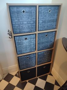 Wooden unit with fabric drawers