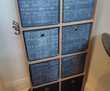 Wooden unit with fabric drawers