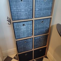 Wooden unit with fabric drawers