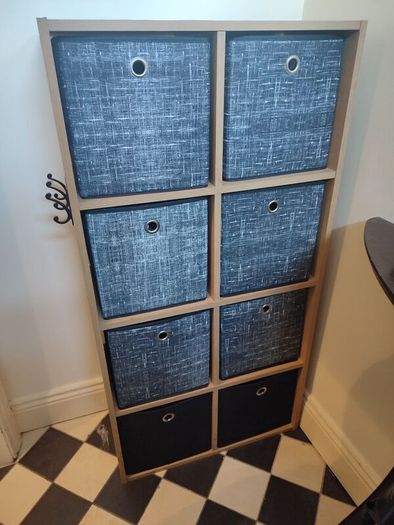 Wooden unit with fabric drawers