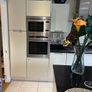 Scavolini kitchen units with Black Granite worktop Image 4