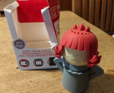 Zap Chef Mad Mama (frequently branded as Angry Mama), a steam-activated microwave cleaning gadget designed to loosen caked-on food splatter and grease without chemical cleaners.
