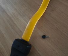 a steering wheel lock with a key