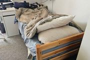 wooden single bed
