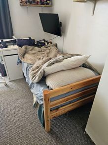 wooden single bed