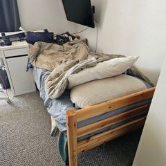 wooden single bed