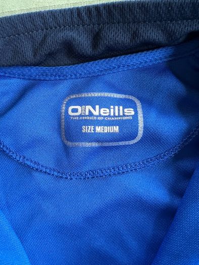 O'Neills half zip top.
