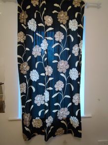 2 identical black floral curtains 180cm L and 114cm W
