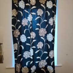 2 identical black floral curtains 180cm L and 114cm W