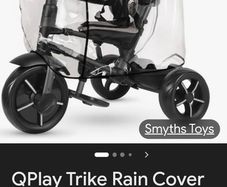 Toddlers trike (red and black) and rain cover